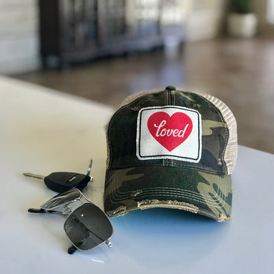 red heart loved patched hat, loved patched distressed trucker hat, love vintage style trucker cap, loved baseball cap